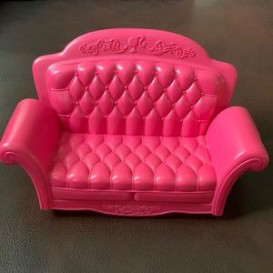 Plastic pink Barbie sofa